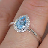 9ct White Gold Pear Shape Blue Topaz Diamond Halo Ring SKU 5506005