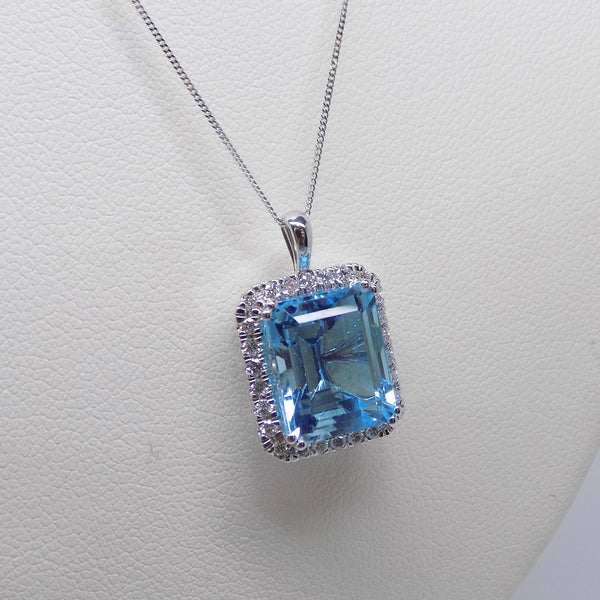 9ct White Gold Diamond Halo Rectangle Blue Topaz Pendant 0.25ct SKU 5541003