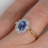 9ct Yellow Gold Oval Sapphire, Round Brilliant Diamond Halo and Baguette Diamonds each side SKU 5706901