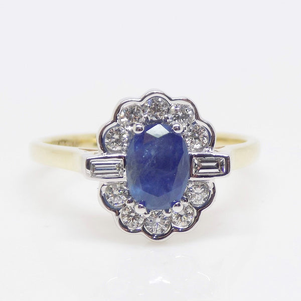 9ct Yellow Gold Oval Sapphire, Round Brilliant Diamond Halo and Baguette Diamonds each side SKU 5706901