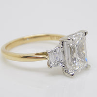 18CT YG and Platinum Head 3 Lab Grown Diamonds, Centre Emerald Cut and side Step Cut Trapezoids 3.03ct Engagement Ring SKU 7707115