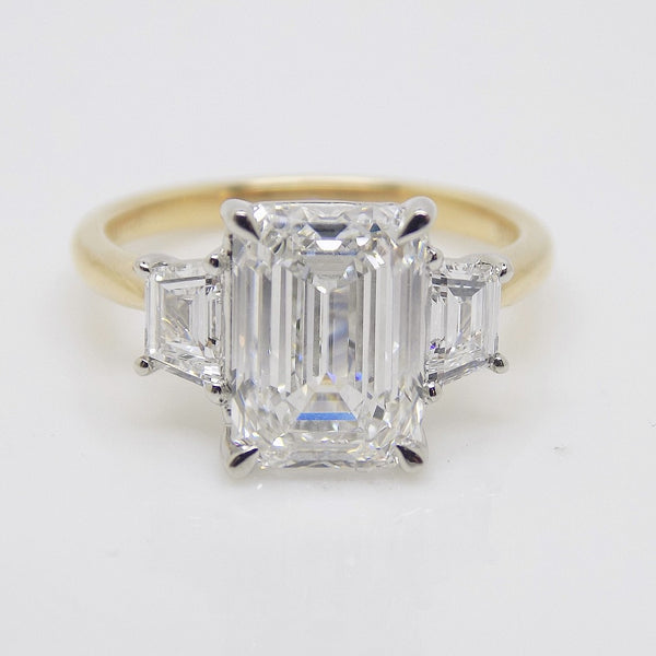 18CT YG and Platinum Head 3 Lab Grown Diamonds, Centre Emerald Cut and side Step Cut Trapezoids 3.53ct Engagement Ring SKU 7707115