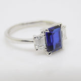 9ct White Gold Emerald Cut Lab Grown Sapphire and Lab Grown Octagon Side Diamonds SKU 7757009