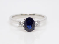 9ct White Gold Oval Sapphire And Round Brilliant Side Diamonds 3 Stone Engagement Ring SKU 5706054