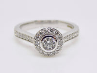 9ct White Gold Rubover Round Brilliant Diamond, Diamond Halo and Shoulders Engagement Ring 0.50ct SKU 6107063