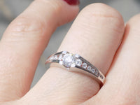 18ct White Gold Round Brilliant Diamond and Channel Set Diamond Shoulders Engagement Ring 0.50ct SKU 8802004