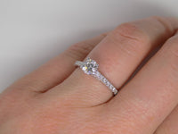 18ct White Gold Claw Set Diamond Shoulders Round Brilliant Diamond Solitaire Engagement Ring 0.69ct SKU 6301022