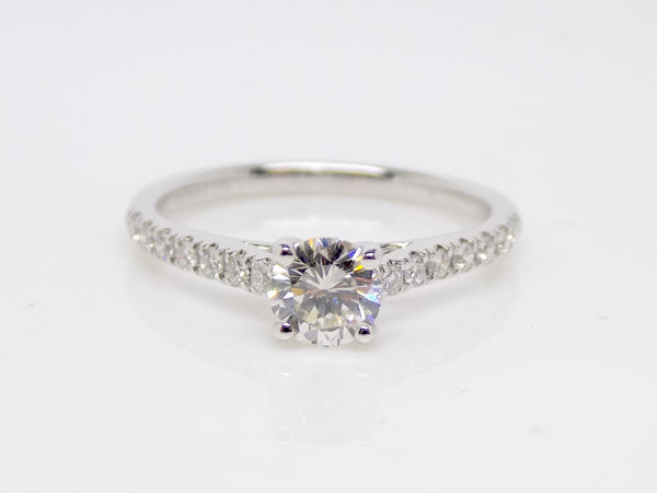 18ct White Gold Claw Set Diamond Shoulders Round Brilliant Diamond Solitaire Engagement Ring 0.69ct SKU 6301022