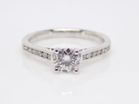 18ct White Gold Channel Diamond Shoulders Round Brilliant Solitaire Diamond Engagement Ring 0.68ct SKU 6301023