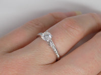 18ct White Gold Channel Diamond Shoulders Round Brilliant Solitaire Diamond Engagement Ring 0.68ct SKU 6301023
