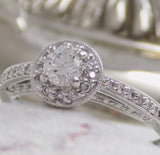 18ct White Gold Round Brilliant Diamond Halo Engagement Ring 0.50ct SKU 8802122