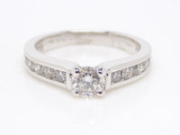 18ct White Gold Channel Diamond Shoulders Round Brilliant Diamond Solitaire Engagement Ring 1.00ct SKU 8802114
