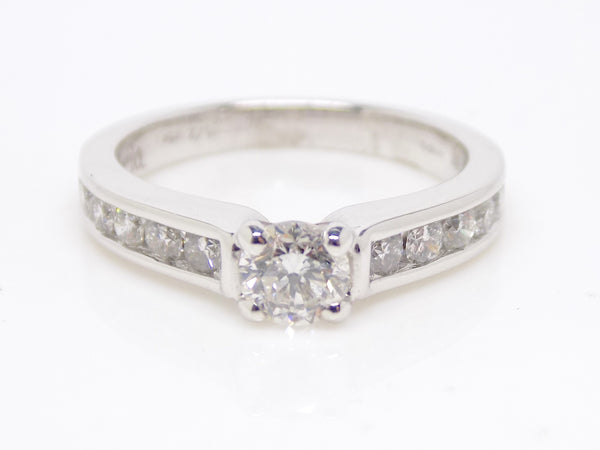 18ct White Gold Channel Diamond Shoulders Round Brilliant Diamond Solitaire Engagement Ring 1.00ct SKU 8802114