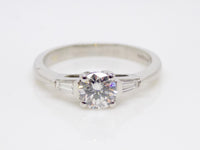 Platinum Round Brilliant Centre Diamond Baguette Diamond Sides 3 Stone Engagement Ring 0.57ct SKU 8803136