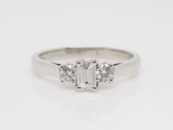 Platinum Emerald Cut Centre Diamond Round Brilliant Diamond Sides 3 Stone Engagement Ring 0.50ct SKU 8803035