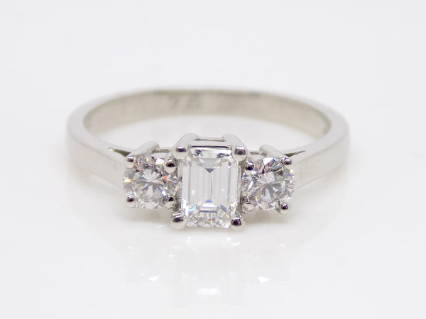 Platinum Emerald Cut Centre Diamond Round Brilliant Outer Diamond 3 Stone Engagement Ring 0.75ct SKU 8803134