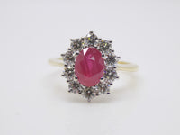 9ct Yellow Gold Oval Ruby, Round Brilliant Diamond Cluster Ring SKU 5606036