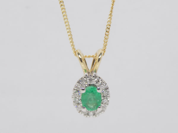 9ct Yellow Gold Oval Emerald Diamond Halo Pendant SKU 1541053